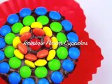 RAINBOW FLOWER CUPCAKES Make these chocolate frosted cupcakes with mini M&Ms for your part