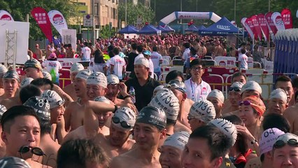Hong Kong swimmers race across Victoria Harbour