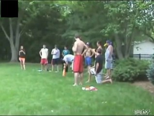 Guy gets hit in nuts by bat