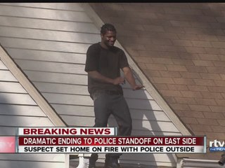 VIDEO: Man in police standoff dances on roof before being apprehended