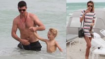 Robin Thicke à la plage avec son fils et sa copine April Love Geary