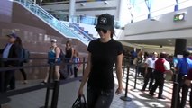 Kendall Jenner Keeps A Lid On Nick Jonas Romance At LAX