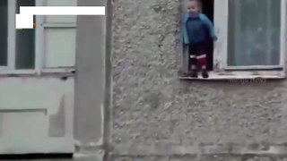 Russian Toddler Balances Weight On The Ledge Of An Eighth Floor Window