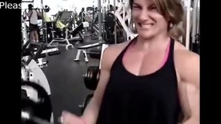 Talented woman arm workout - bodybuilding