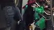 Skeleton puppet does Air Guitar in Subway over guns n' roses