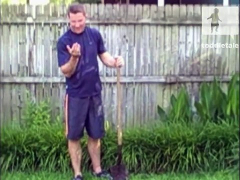 Toddler holds a worm for the first time. Then he eats it!