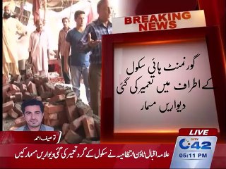 Allama Iqbal Town administration demolishes walls built around school