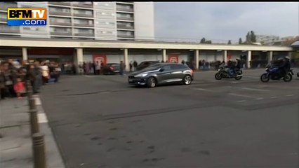 Hollande accueilli par des huées et quelques encouragements à La Courneuve