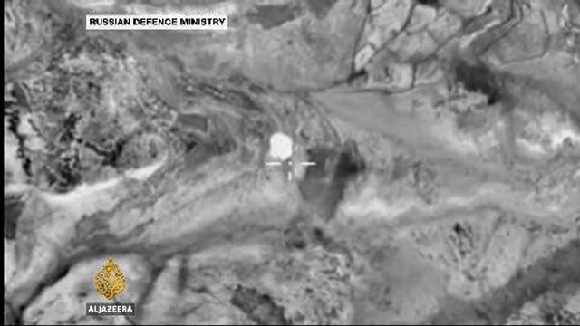 Activists: Russian air strikes in Syria kill scores