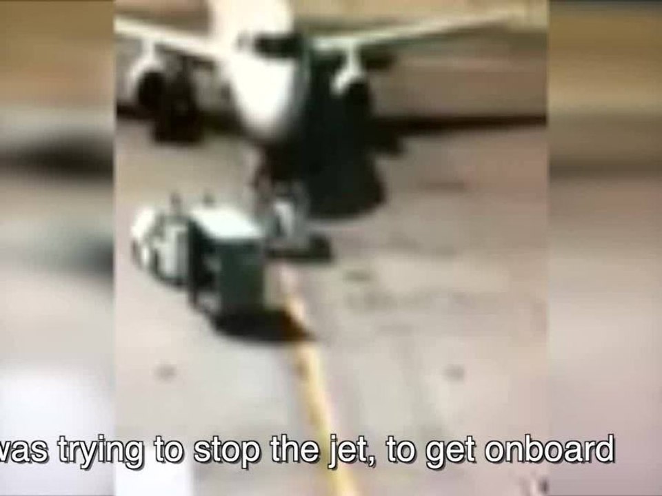WATCH: Man runs onto tarmac trying to stop jet