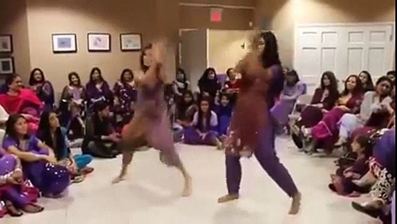 two girls dancing on chammak challo in wedding