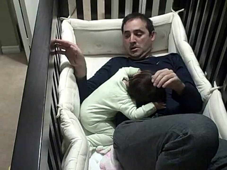 Father goes into baby crib!