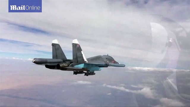 Russian jet drops a 'high-precision' bomb which destroyed Syrian rebel group's