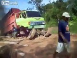 Truck falls apart while pulling a load