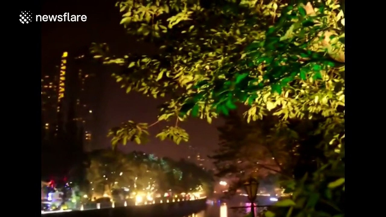 Woman heroically fireman carries drunk man to safety