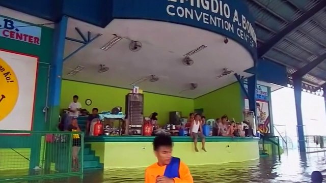 Temporary evacuation centres flooded after Typhoon Koppu