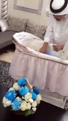 Grandfather showers newborn with cash