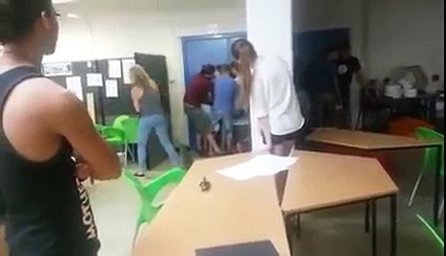 White Students barricading themselves against black rioters outside in South Africa