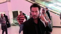 Keanu Reeves Takes A Call And Avoids The Paps At LAX