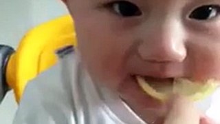 A cute baby's expressions when he eat Lemon - very funny Must Wath | hahahaha