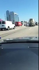Cement truck driver just doesn't care - rear ends car; keeps pushing it down the highway