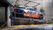Improperly secured race car takes a 30-foot drop