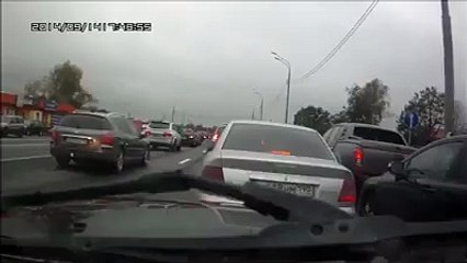 Road raging driver gets a surprise when he confronts someone in traffic