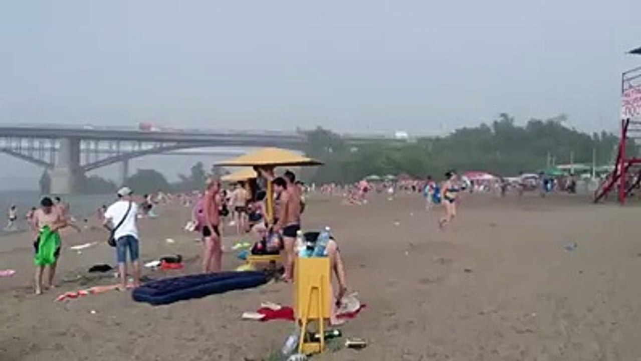 Surprise hailstorm pelts Russian beach-goers with fist sized chunks of ice