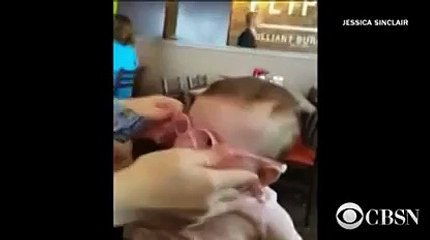 Baby sees clearly for the first time and the smile factor is off the charts