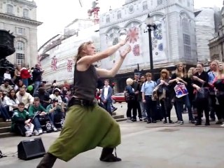 Best ! !! Street performer with glass orb, on Wedding day of Prince William, Piccadilly Circus