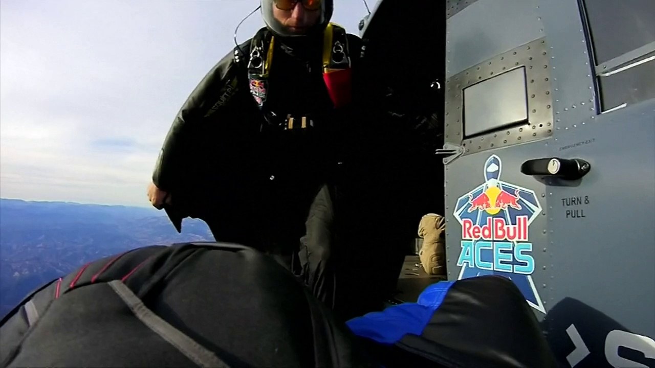 Wingsuit flyers race through slalom course