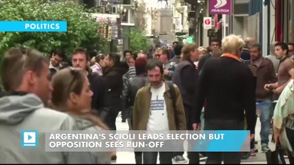 Argentina's Scioli leads election but opposition sees run-off