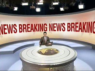 News Anchor reporting during earthquake