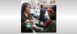 AKP broşürü dağıtan kadınlara kadın tepkisi