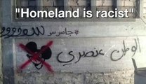 (SPOILER ALERT) 'Homeland is racist' artist explains graffiti - BBC News
