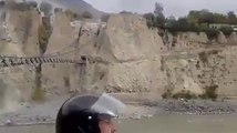 footage of a bridge shaking because of earthquake in Pakistan