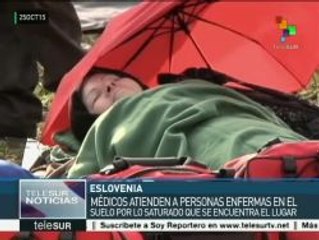 Download Video: Eslovenia: refugiados son atendidos por médicos en el suelo