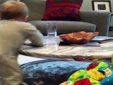 Baby Can't Resist Knocking Over the Water