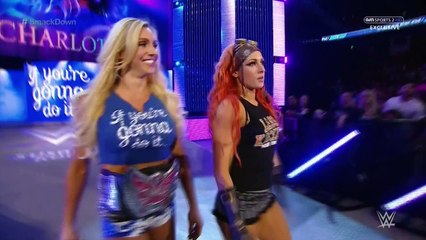 Paige (w/ Becky Lynch and Charlotte) vs. Nikki Bella (w/ Team Bella)