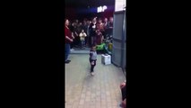 Dancing toddler leads whole troupe of dancers in Chinese square