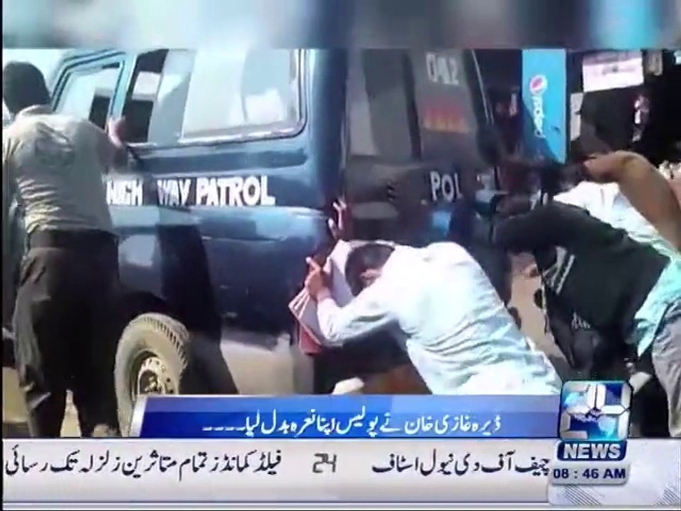 Students are pushing a Police van