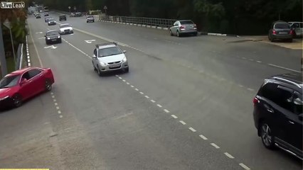 LiveLeak - Biker Slams into Turning Car and Almost Flips It !