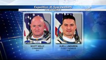 Astronauts walk outside International Space Station