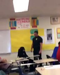 Cop Violently Attacks Peaceful Female Student Sitting in Her Desk