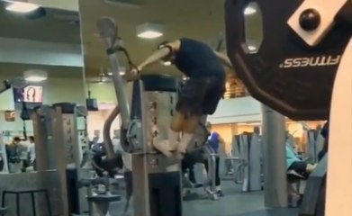 Crazy Guy Doing Crossfit On The Weight Machine