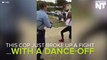 Cop Breaks Up Fight By Challenging Girl To Dance-Off