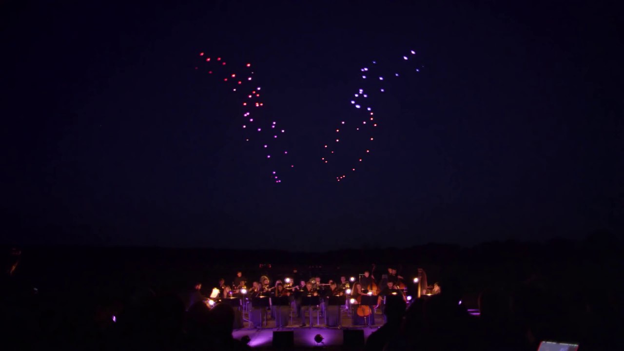 Beautiful light Show made with 100 Drones flying over Classical Orchestra - World Record