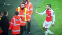 Theo Walcott gets a fan on the pitch for a bump  then gives him his shirt Pure class