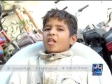 Orphan Child lives in Garbage dump in Orangi town Karachi