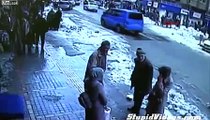 Snow Falls Off Roof Burying Pedestrians
